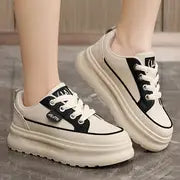 Platform Sneakers – Adds height while keeping it sporty.