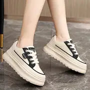 Platform Sneakers – Adds height while keeping it sporty.